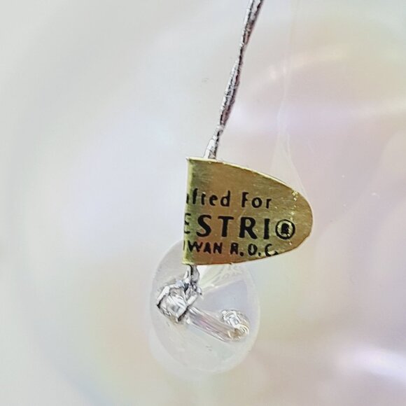 Silvestri Handcrafted Iridescent Blown Glass Whale Ornament with Flaw - Picture 4 of 13